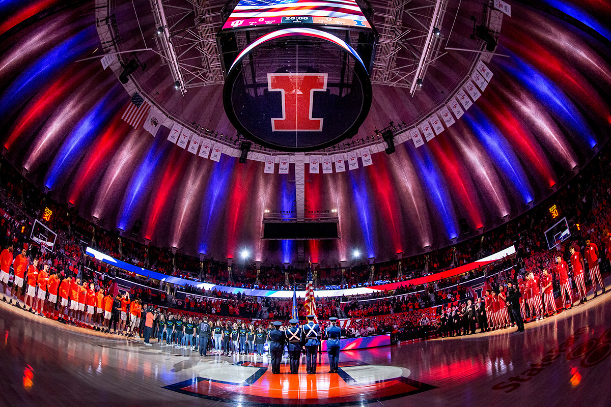 Inside State Farm Center lit up in orange and blue for an Illini basketball game