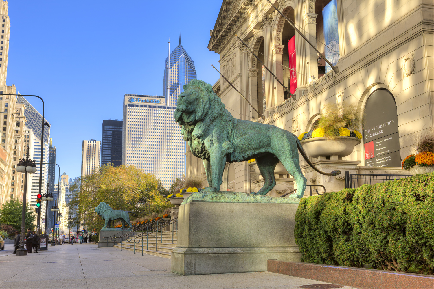 Famous lion sculpture in front of Art Institute in Chicago on a sunny day